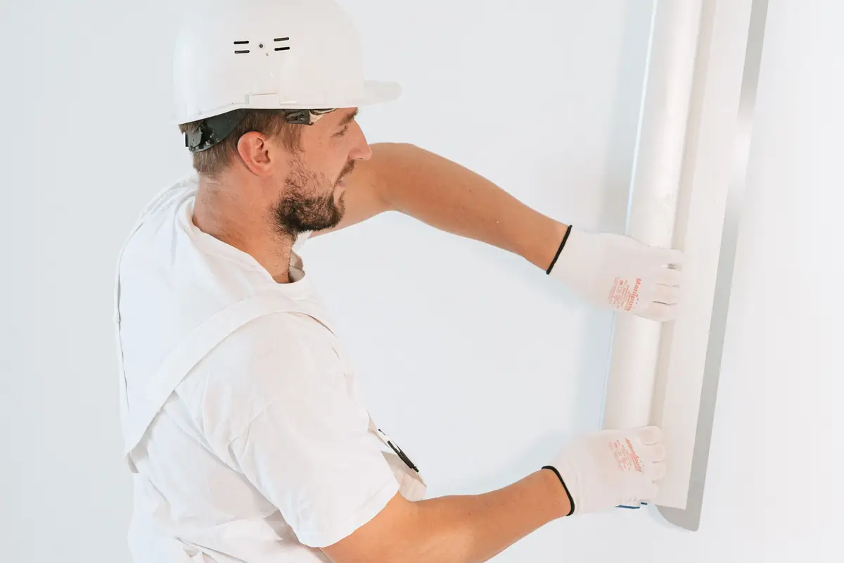 Gypsum board partition wall being built in a Dubai apartment