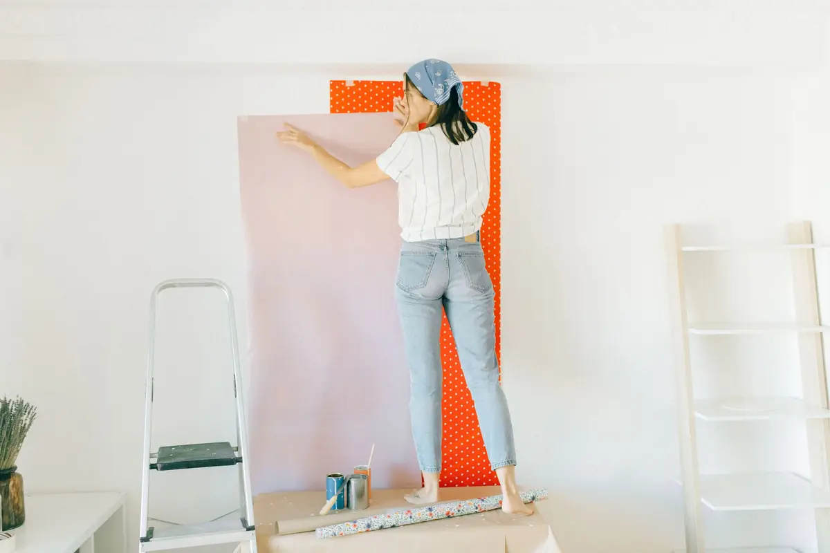 Wallpaper being installed on a feature wall in Dubai